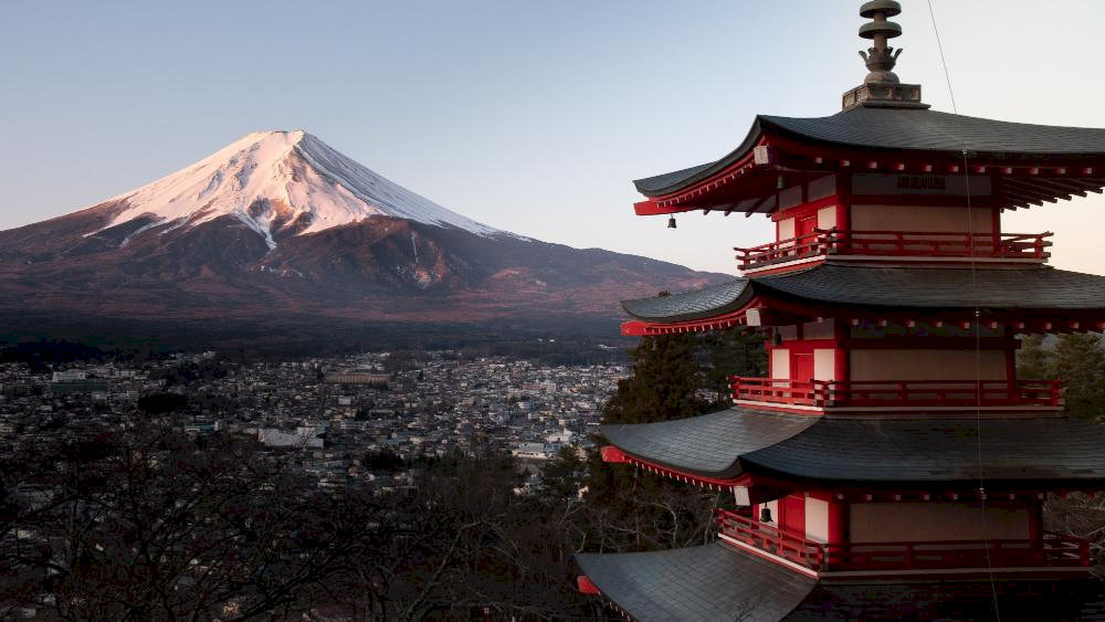 The mesmerizing beauty of Fuji is particularly stunning at sunrise or during cherry blossom season